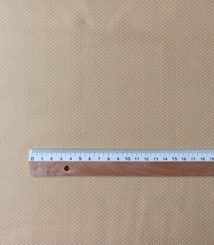 TELA OCRE CON TOPOS BLANCOS